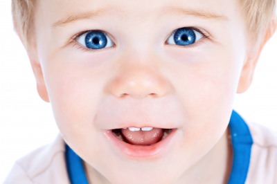 little boy's face with blue eyes