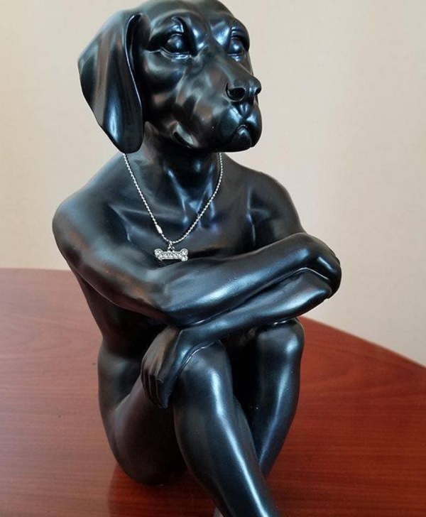 funny pictures of bad ideas, black statue of a human's body sitting with their knees held having a dog's head