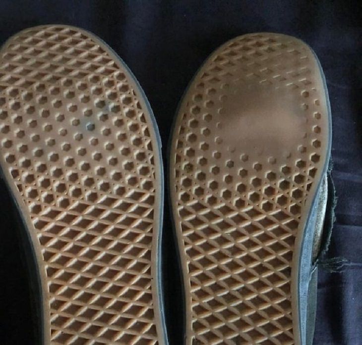 difference in comparison of random things, soles of a pair of shoes, one clean and the other partly worn out in one spot