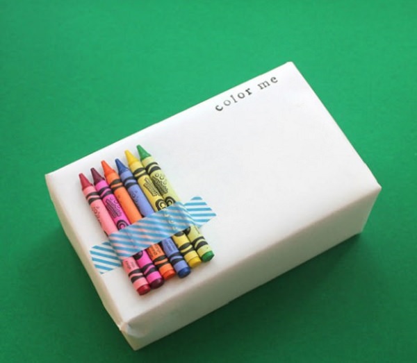 DIY ways of Gift-Wrapping Presents, color-me wrapping paper with crayons taped