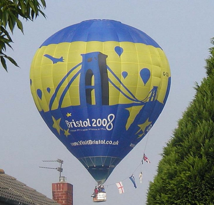 Different Hot air Balloons from Around the World, Hot air balloon over Yate, England, blue and yellow bristol hot air balloon