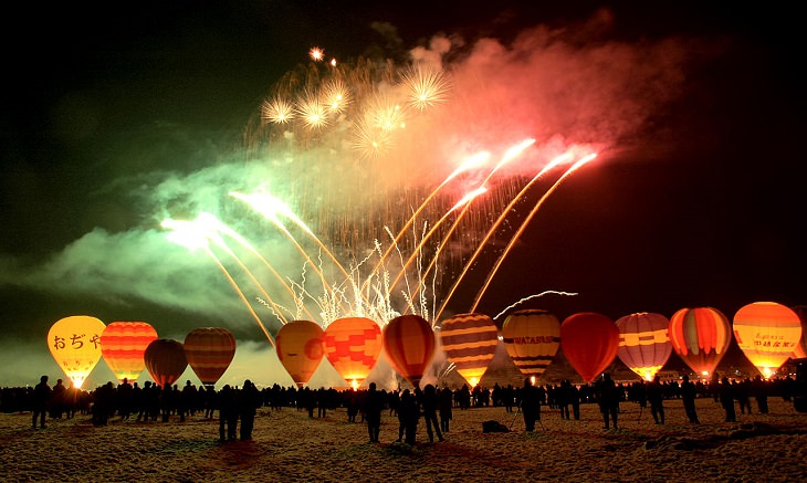 Different Hot air Balloons from Around the World, Balloon glow with Firewoks. Niigata, Japan, 2006 Ojiya Balloon Festival, Night Event