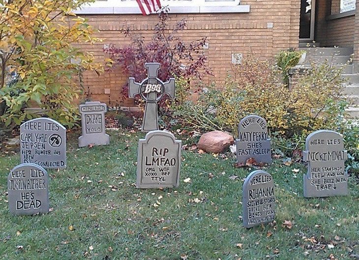 Most Incredible Halloween Decorations, series of false tombstones with the names of current pop stars like Justin Bieber