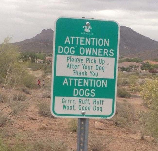 Funny warning and caution signs, sign on beach instructing dog owners to pick up after their dogs and a notice to dogs saying Grrrr, ruff ruff, woof good dog