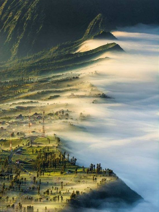 Interesting Things Only Found on Earth, mist fading and sun rising over Mount Bromo, Philippines
