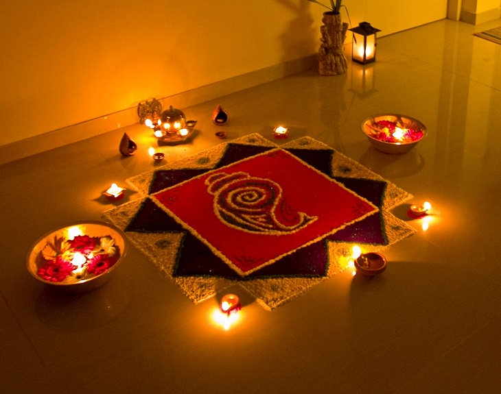 Photos from Diwali, the festival of lights, Rangoli/Kolam, decorations made from colored powders and lamps