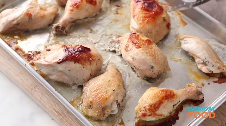 Simple and easy recipe for golden chicken with buttermilk marinade, roasted golden chicken on a cooking tray