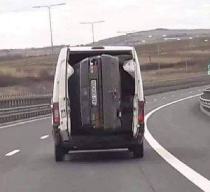 Hilarious but Smart Life Hacks, large white van with smaller black car in the back