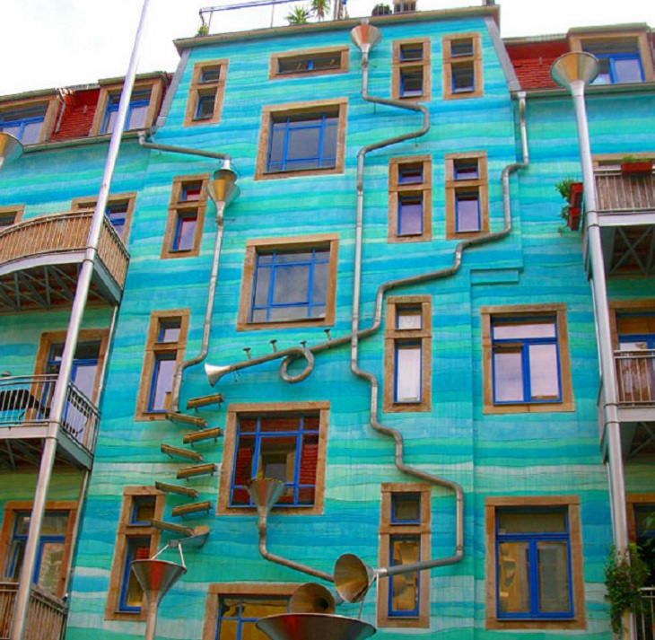 Incredible Innovative Design Ideas, beautiful blue wall on the side of a building with series of pipes designed to play music when it rains