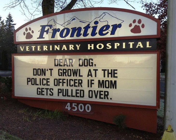 Pet Jokes found on signs outside veterinary clinics and animal hospitals, sign reading "Dear dog, don't growl at the police officer if mom gets pulled over",  Frontier Veterinary Hospital