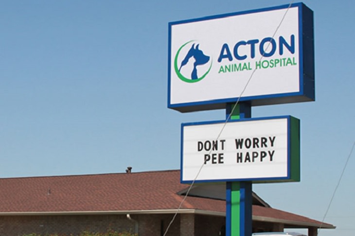Pet Jokes found on signs outside veterinary clinics and animal hospitals, sign reading "Don't worry, pee happy", Action Animal Hospital