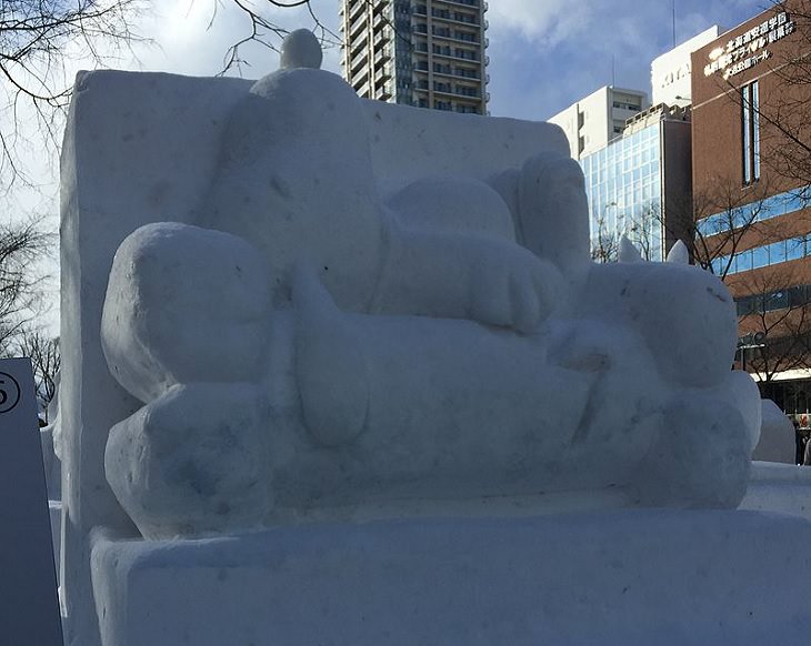 Snow Sculptures and Statues from Festival, A sleeping Snoopy snow sculpture made for the 67th Sapporo Snow Festival
