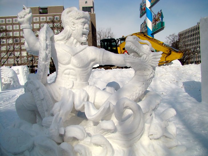 Snow Sculptures and Statues from Festival, Battling a Dragon, at the Sapporo Snow Festival 2011
