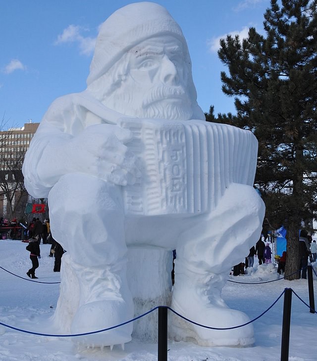 Snow Sculptures and Statues from Festival, A snow sculpture of an accordionist (L'accordeoniste) from Winterlude in Ottawa and Gatineau, Canada, Februrary 2011