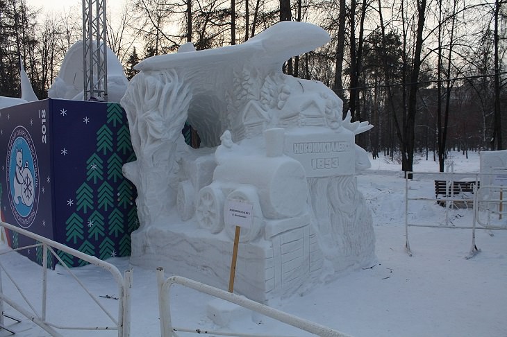 Snow Sculptures and Statues from Festival, A Scuplture of a Train amidst a village at the 18th Siberian Snow Sculpture Festival, Novosibirsk, Russia