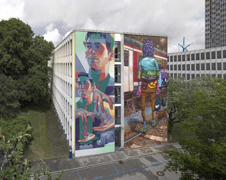 Beautiful Street art and graffiti murals from around the world, Aryz's and OsGemeos's mural in Munich (2017), mural split into two frames, one with a young man making a shape with both his hands and the next with a man in brown pants, blue shirt and having purple hair on a train track