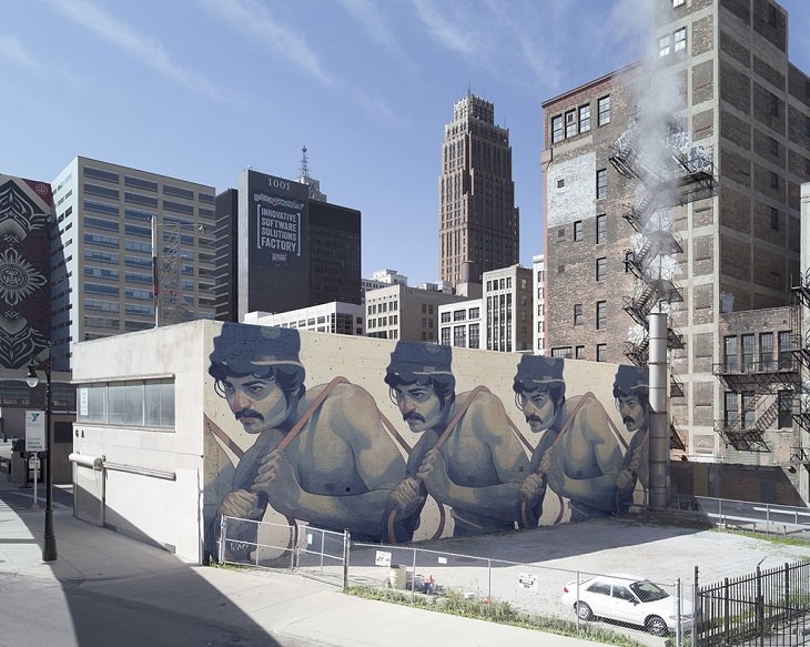 Beautiful Street art and graffiti murals from around the world, Aryz's mural in Detroit (2015), mural of 4 identical men with black curly hair and mustaches pulling something with rope over their shoulders