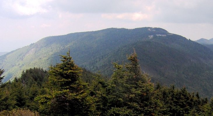 Beautiful sights and views of various mountains, peaks and wildlife in the blue ridge mountain range, Mount Mitchell, the Highest Peak of the Blue Ridge Mountain Range, as viewed from Mount Craig of the Black Mountain Range