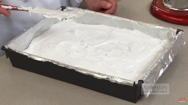 Perfect Recipe for Homemade marshmallows, marshmallow mix being spread into a pan