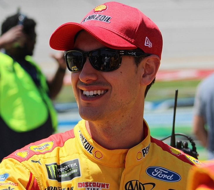 Top 19 NASCAR Race Drivers to Win Multiple Tracks, joey logano where a hat and smiling