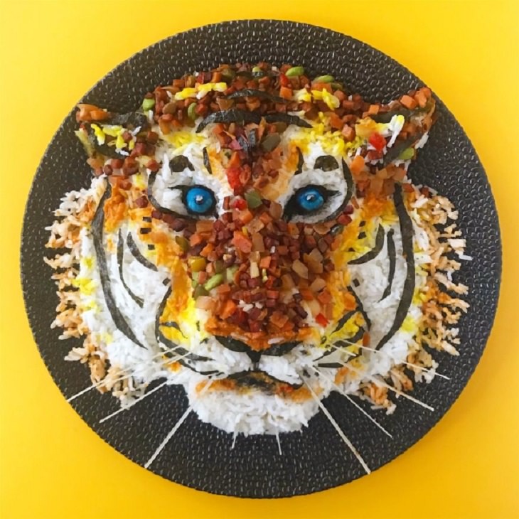 Beautiful and creative artwork made with food on plates by de meal prepper, art made from food, Tiger head