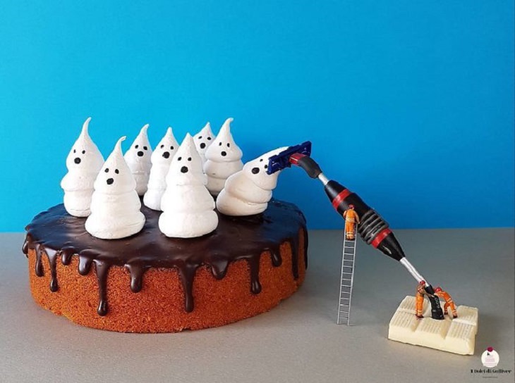 Beautiful Cakes Designed by Italian Chef, Vanilla cake with chocolate dropping icing and marshmallow ghosts on top, one of which is being sucked by a miniature vacuum