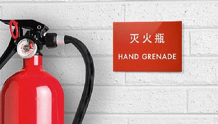Funny foreign language signs, translations fails, fire extinguisher with a sign next to it saying hand grenade