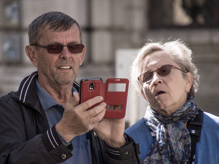 senior citizen with smartphone