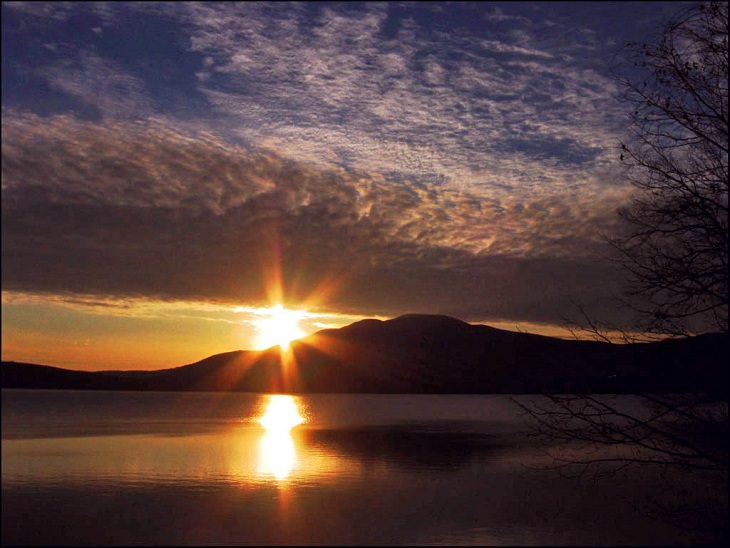 Photographs of The Catskill Mountain Range in the Appalachian Valley, Sunset over Ashokan High Point, a nearby mountain which provides a scenic backdrop to the reservoir