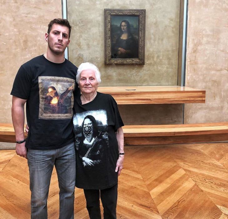 duo of grandmother and grandson, ross smith, wear fun costumes for social media, in front of the Mona Lisa wearing funny mona lisa t-shirts