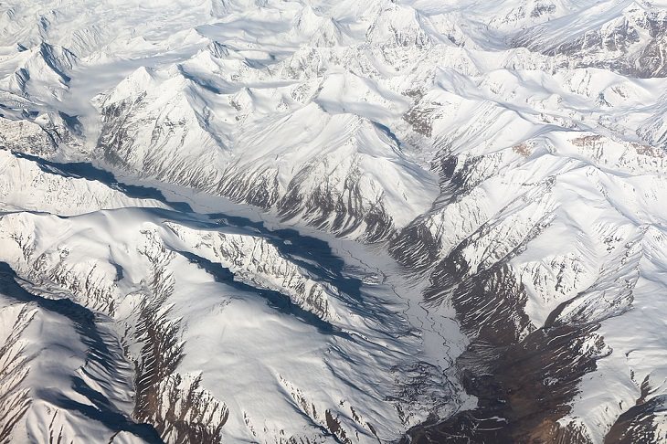 Pictures of the tallest peaks and beautiful landscapes found in the Himalayas, An aerial view of the Himalayan Range in Ladakh, India