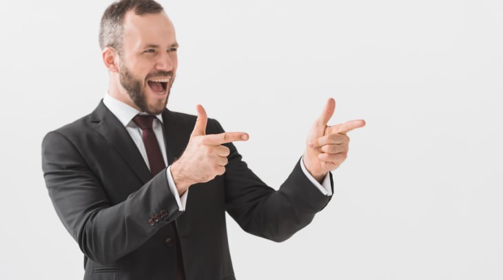 business jokes businessman pointing and laughing