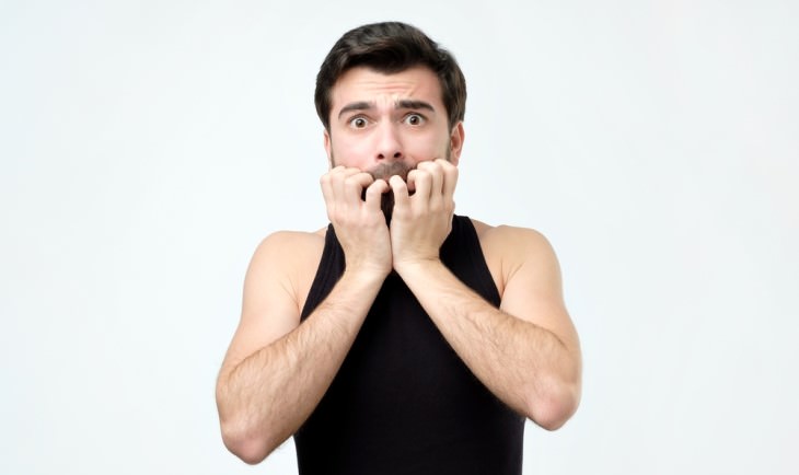 joke man scared with fingers in mouth