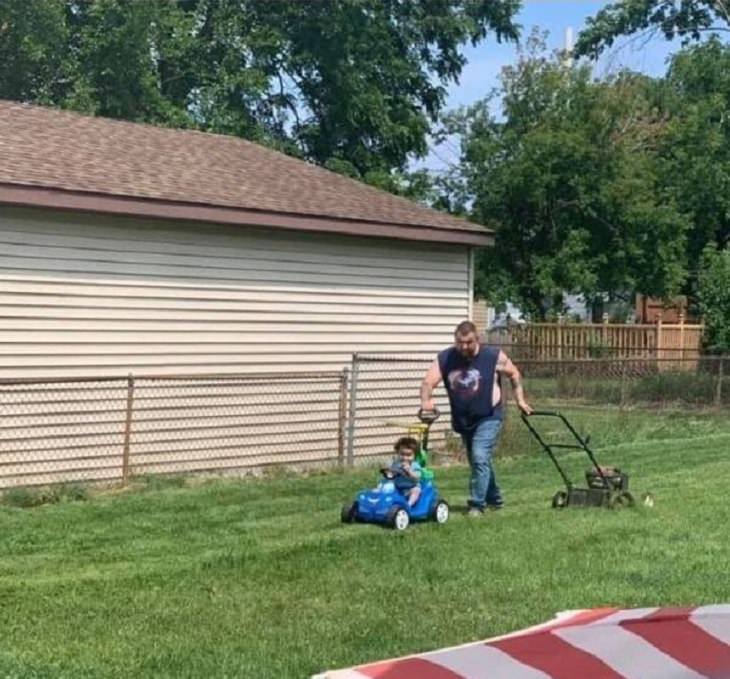 Hilarious photographs that show the best parents and parenting done right, father mowing lawn and pushing child in stroller at the same time