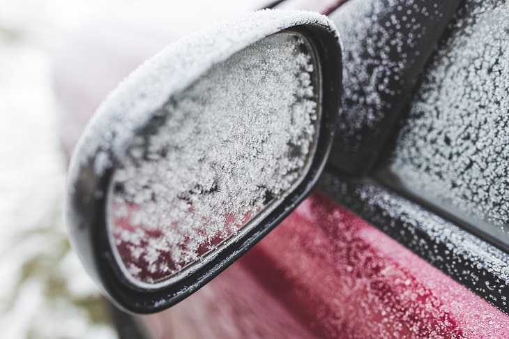 Helpful Winter Life Hacks On a Budget for dealing with Ice, Frost and Snow, red car and side-view mirror