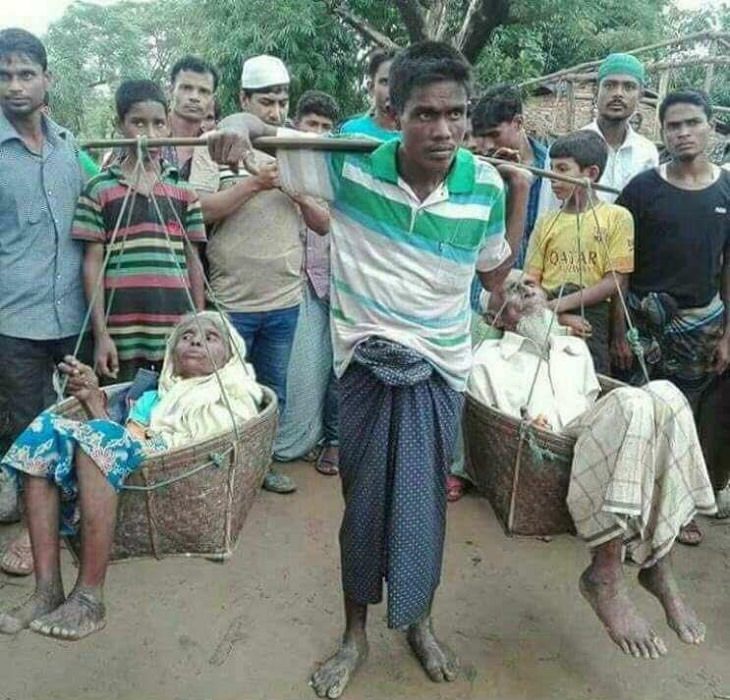 Wholesome and heartwarming pictures and stories, This man, forced to flee from Bangladesh to Burma, didn’t want to leave his bedridden parents behind and carried them 100 miles on his shoulders