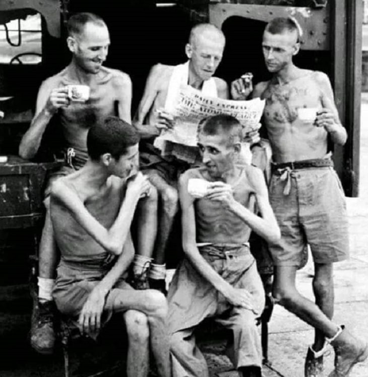 Wholesome and heartwarming pictures and stories, Australian soldiers sharing a cup of tea and happiness after being liberated from a Japanese Concentration Camp in 1945