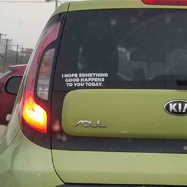 Wholesome and heartwarming pictures and stories, sticker on car saying “I hope something good happens to you today”.