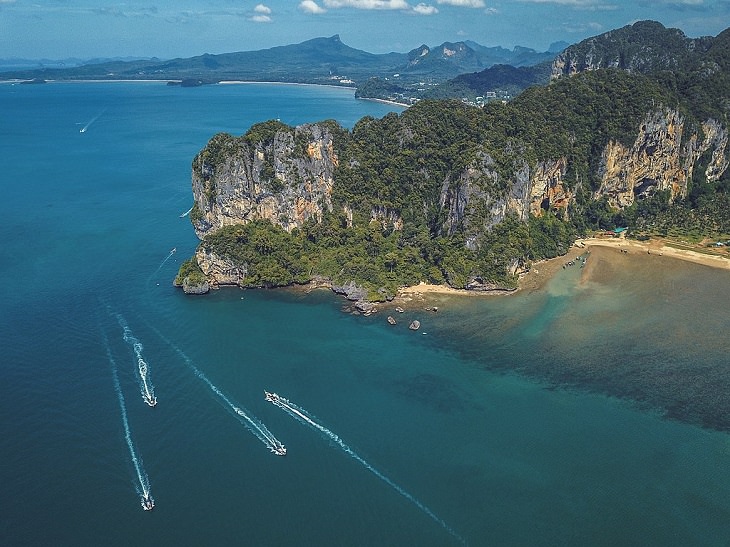 The sights, destinations and fun activities of cultural hub and land of beaches, Krabi in Thailand, An aerial view of Hat Noppharat Thara–Mu Ko Phi Phi National Park, a natural heritage site