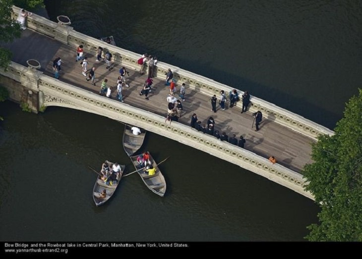 Aerial photos of New York City in “New York City From the Air” series by Yann Arthus-Bertrand, Bow Bridge and the Rowboat Lake in Central Park, Manhattan