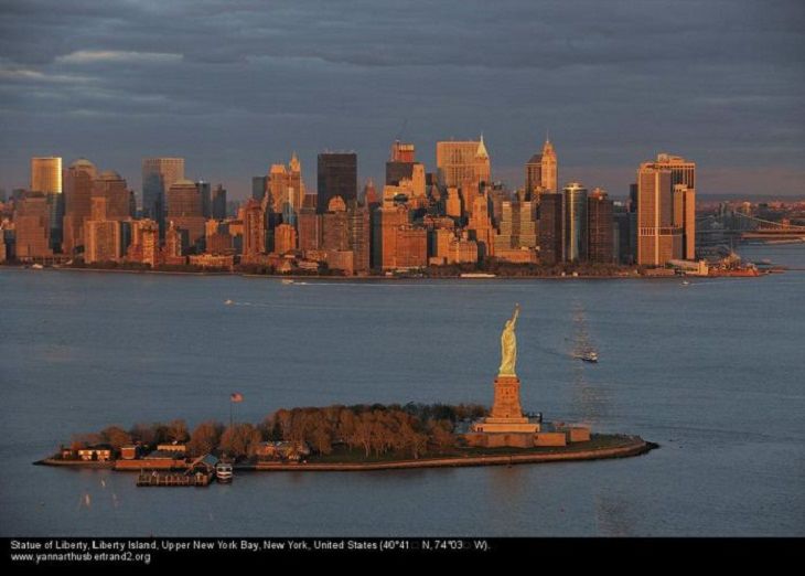 Aerial photos of New York City in “New York City From the Air” series by Yann Arthus-Bertrand, Statue of Liberty, Liberty Island, Upper New York Bay