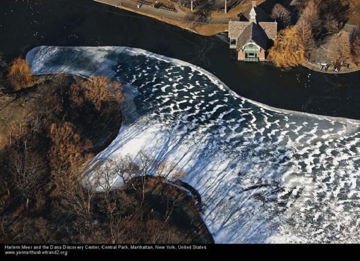 Aerial photos of New York City in “New York City From the Air” series by Yann Arthus-Bertrand, Harlem Meer and the Dana Discovery Center, Central Park, Manhattan