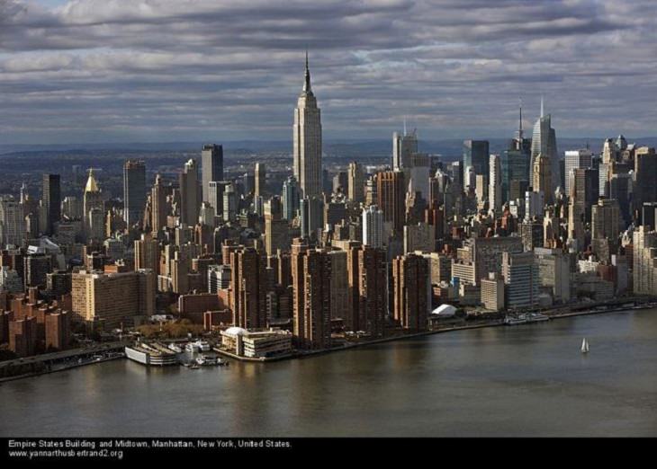 Aerial photos of New York City in “New York City From the Air” series by Yann Arthus-Bertrand, Empire States Building and Midtown, Manhattan