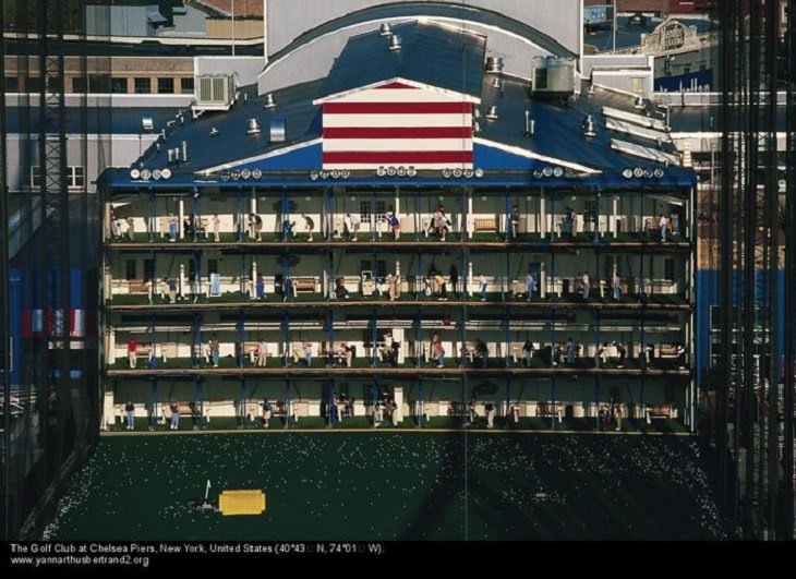 Aerial photos of New York City in “New York City From the Air” series by Yann Arthus-Bertrand, The Golf Club at Chelsea Piers