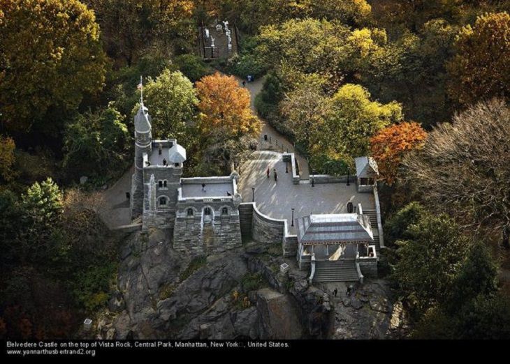Aerial photos of New York City in “New York City From the Air” series by Yann Arthus-Bertrand, Belvedere Castle at the top of Vista Rock, Central Park, Manhattan