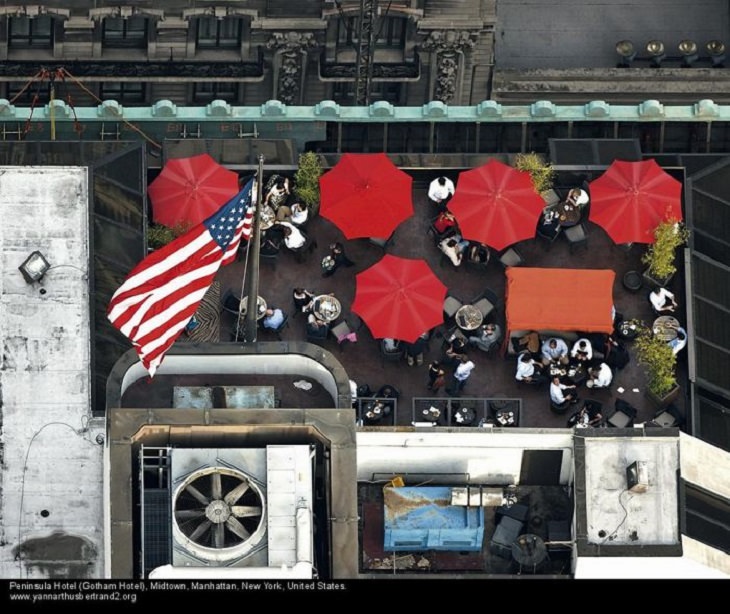 Aerial photos of New York City in “New York City From the Air” series by Yann Arthus-Bertrand, Peninsula Hotel (Gotham Hotel), Midtown, Manhattan
