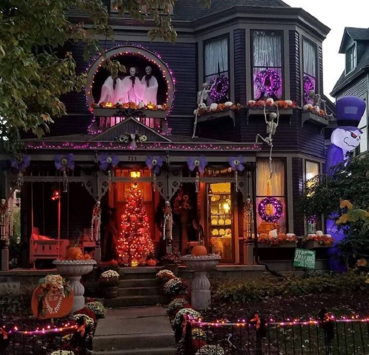 Creative and spooky halloween decorations from 2020, Mixture of halloween and christmas decorations with purple lighting.