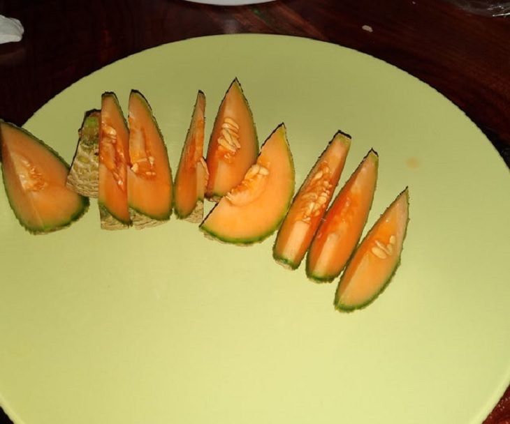  Fruits and vegetables of various big and small sizes, Really small melon sliced on plate