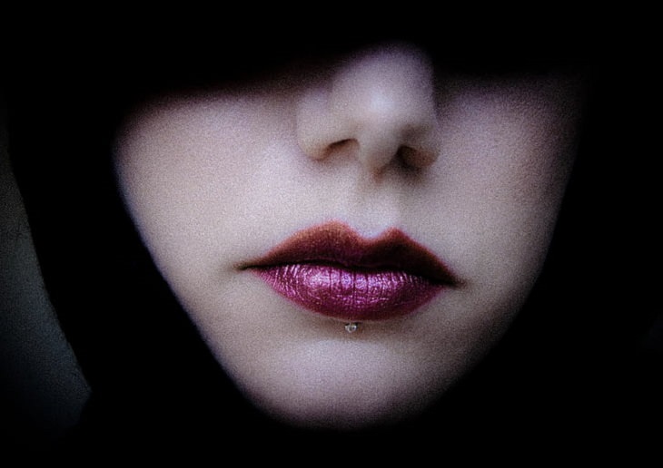 Names of everyday items you didn’t know, Close-up of woman’s face with red lipstick, philtrum