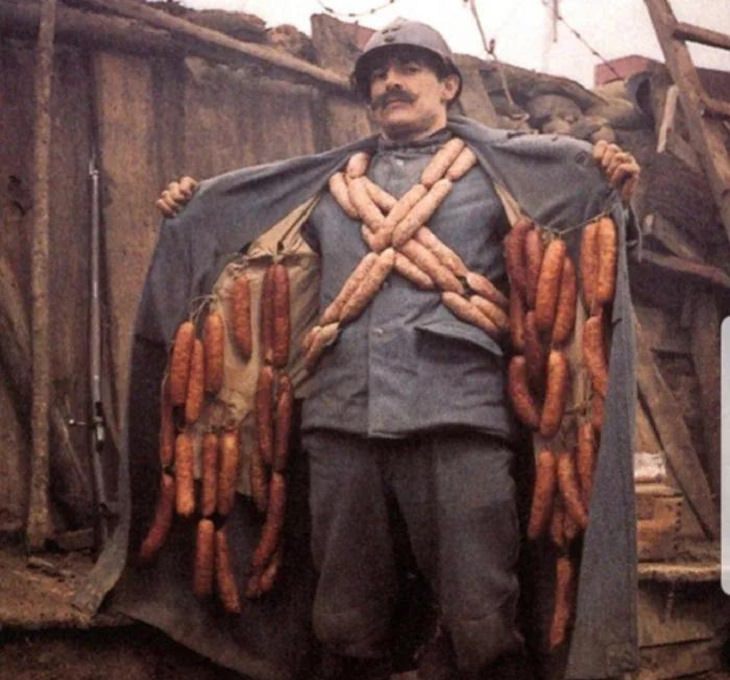Hilarious and clever Halloween costumes based on puns and word play, Man in a trench coat lined with brat wurst in WWI